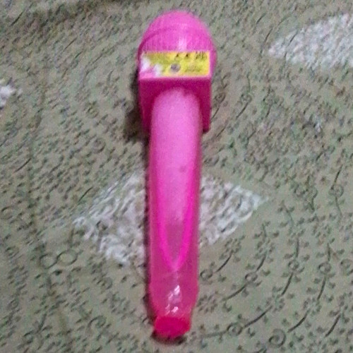 Pink handheld toy microphone - toy,